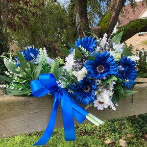 A teardrop wedding bouquet collection of gerbera and daisies