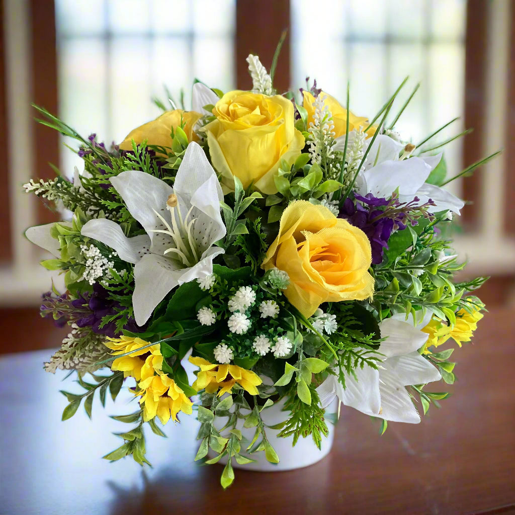 a yellow and purple flower arrangement