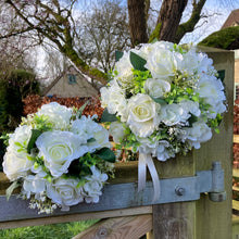 wedding bouquet of ivory roses and hydrangea