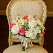 a brides wedding bouquet of artificial pink & ivory hydrangea roses & lily
