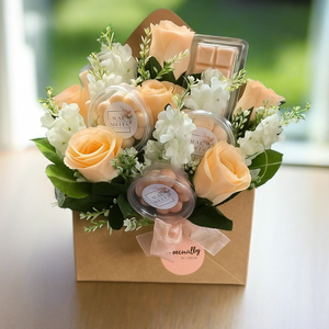 wax melts and peach faux silk roses in a gift box for her