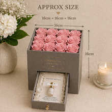 pink faux silk Rose flowers in grey hat box with perfume gift
