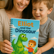Woman and child holding a book titled 'Elliot and the Dinosaur'