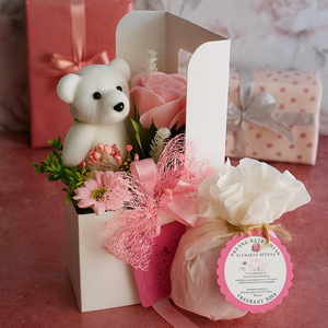 bath bomb with fragrant rose essential oil plus teddy and soap flowers