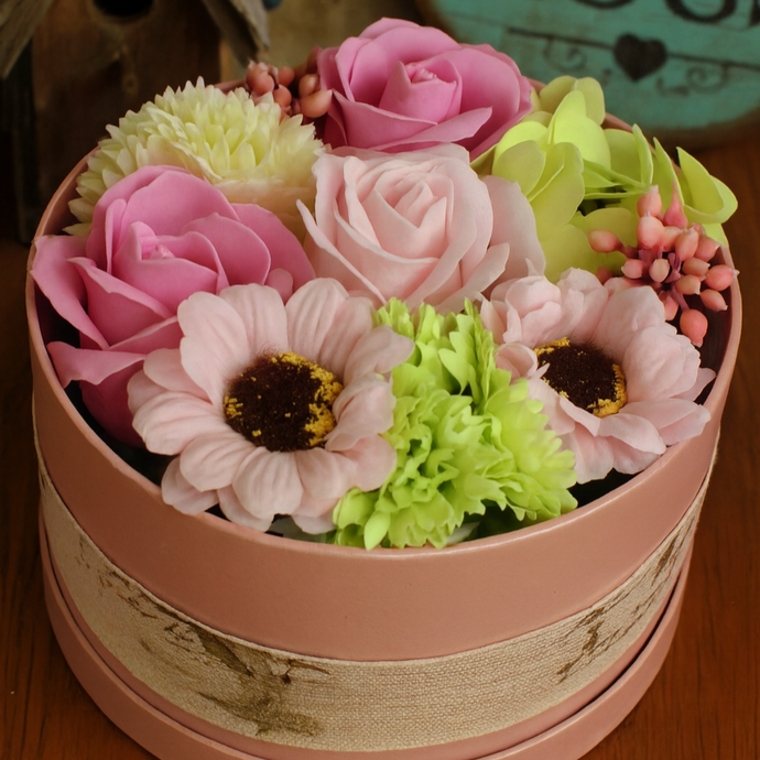 a hat box of soap flowers