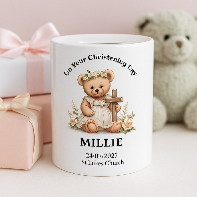 White mug with teddy bear design and personalized text on a light pink background