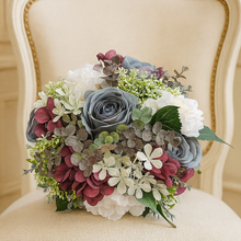 Wedding bouquet in shades of lilac grey burgundy and pink