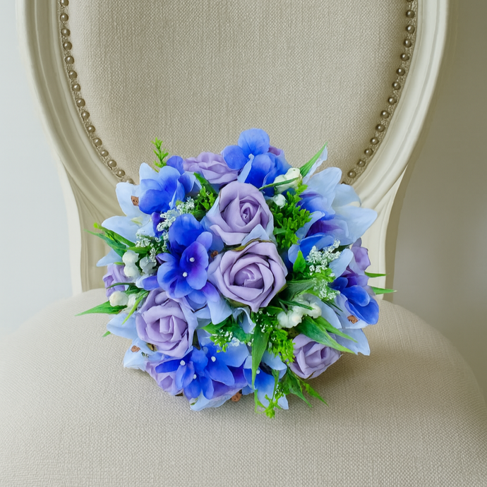 Artificial wedding bouquet of Ivory and lilac rose lily and hydrangea flowers