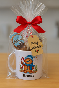 a christmas ceramic mug, hot chocolate marsh mallows, chocolate & sweets