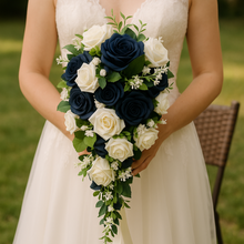 A teardrop bouquet of navy and ivory artificial roses flowers