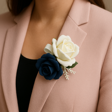 A teardrop bouquet of navy and ivory artificial roses flowers