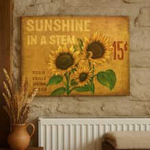 Decorative wall art with sunflowers and text on a stone wall.