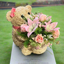 Child graveside memorial teddy with pink or yellow/blue/cream flowers