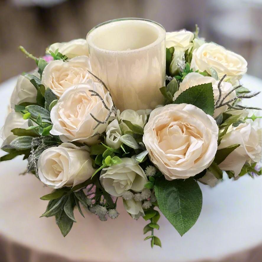 table flower arrangement with candle