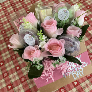 Mother’s Day gift, wax melts and pink silk roses arranged in kraft box