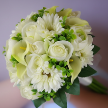 a wedding bouquet of artificial silk ivory hydrangea, calla and rose flowers