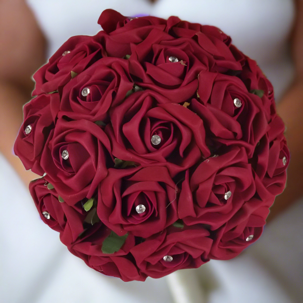 a wedding bouquet of burgundy foam rose flowers with diamante centres