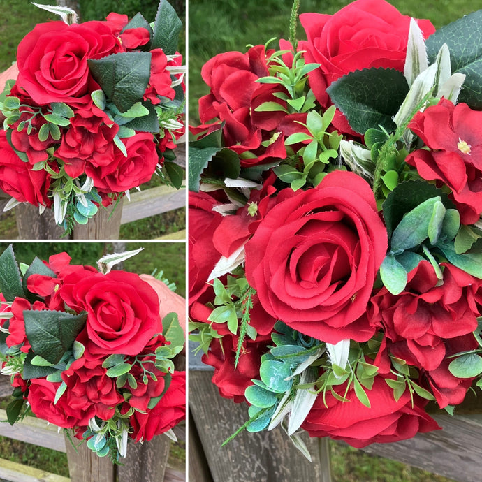 A wedding bouquet collection of artificial red flowers