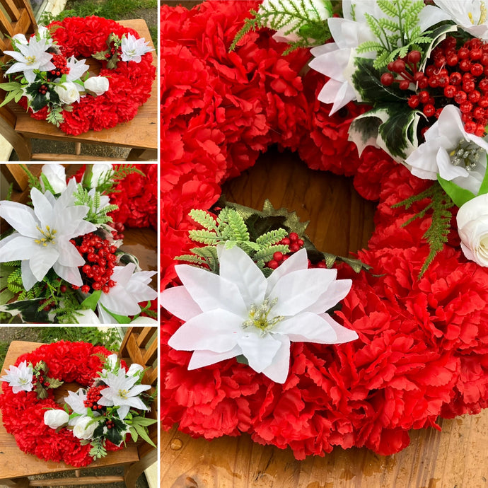 a based christmas wreath of red carnations