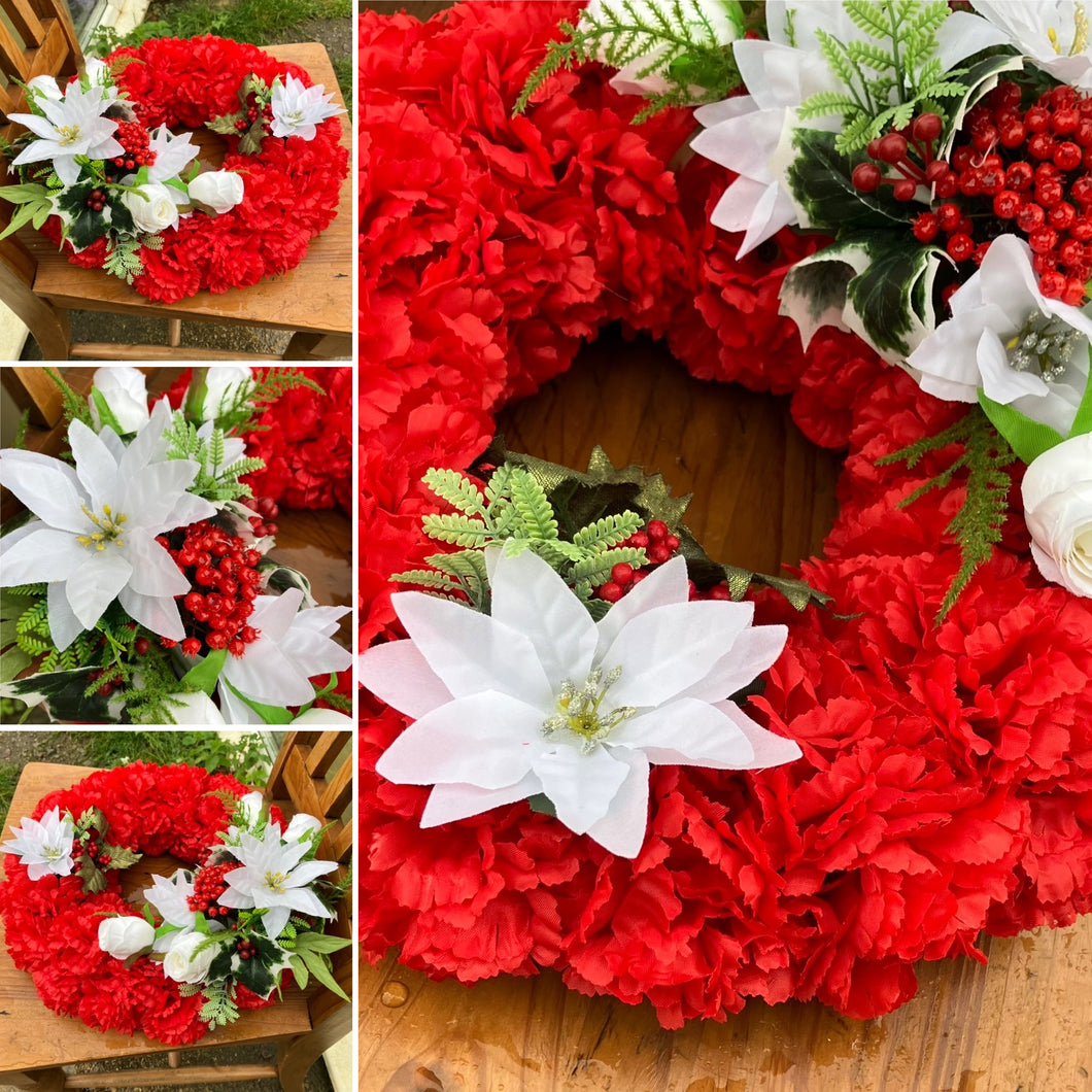 a based christmas wreath of red carnations