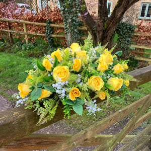 flower arrangements featuring yellow roses