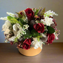 artificial flowers in hat box