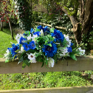 A teardrop wedding bouquet collection of gerbera and daisies