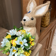 Child’s graveside memorial rabbit planter with flower arrangement