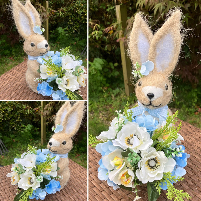 Child’s graveside memorial rabbit planter with flower arrangement