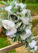 A teardrop wedding bouquet collection featuring sage and white roses