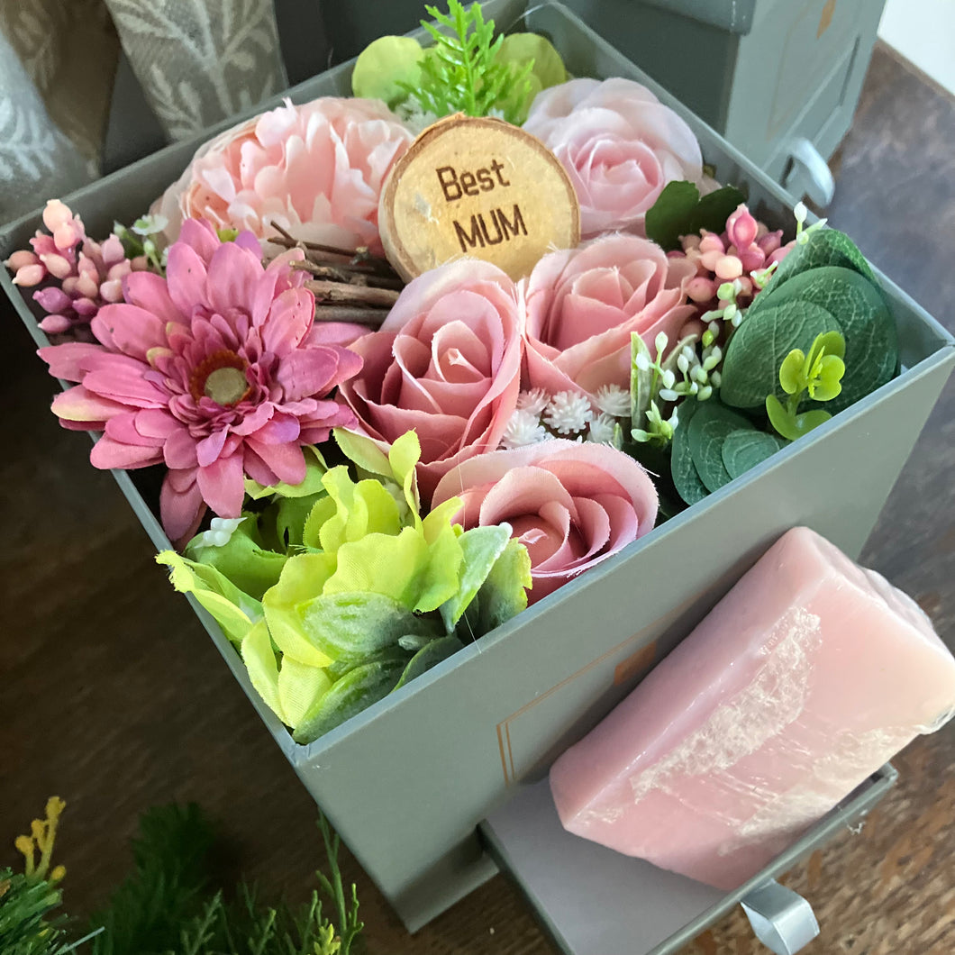 flower arrangement in grey hat box - pink