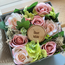 flower arrangement in grey hat box - pink