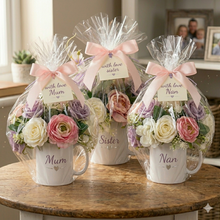 Flower arrangement in ceramic mug