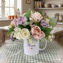 Flower arrangement in ceramic mug
