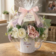 Flower arrangement in ceramic mug