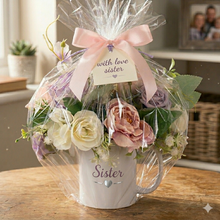 Flower arrangement in ceramic mug