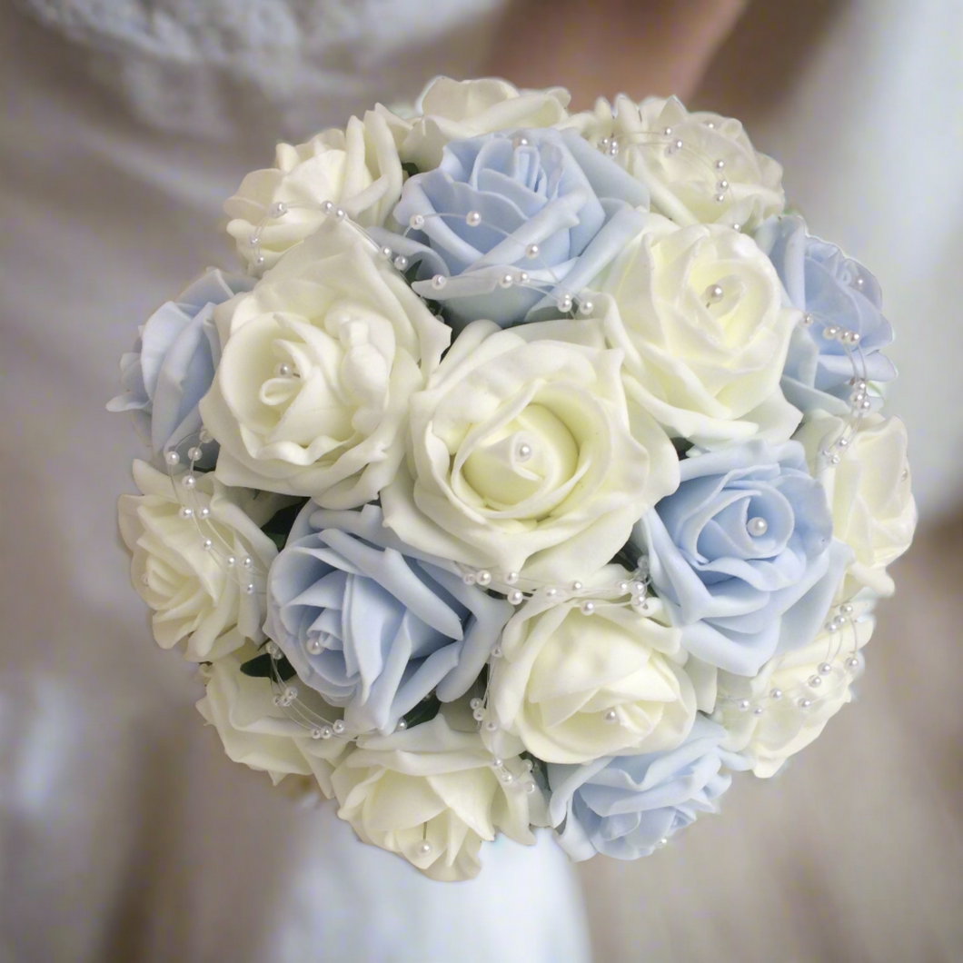 A bouquet collection of artificial baby blue & ivory foam roses with pearl centres