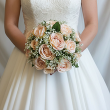 A bridal bouquet collection of gypsophilia & blush coloured roses