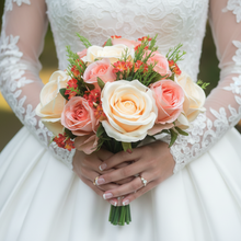 A wedding bouquet collection of artificial peach roses