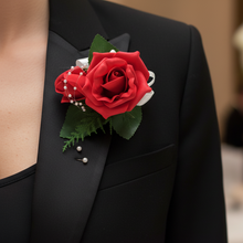 a corsage featuring foam roses
