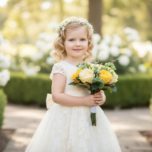 A wedding bouquet of yellow and champagne silk roses ideal for a flowergirl or young bridesmaid