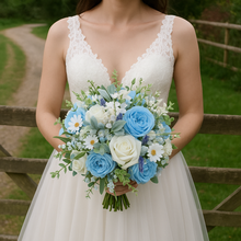 wedding bouquet of blue and white artificial silk flowers