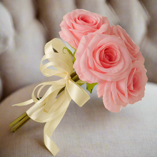a bridesmaid posy of large pink artificial faux silk open roses