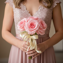 a bridesmaid posy of pink artificial faux silk open roses
