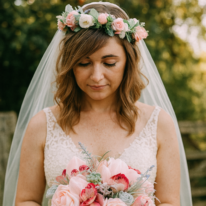 a pink rose flower crown of pink and lilac flowers