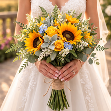 a brides bouquet of sunflowers roses and blue forget-me-nots
