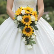 A teardrop bouquet collection of artificial ivory roses and sunflowers