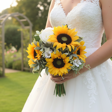 a brides bouquet of artificial sunflowers daisies and roses