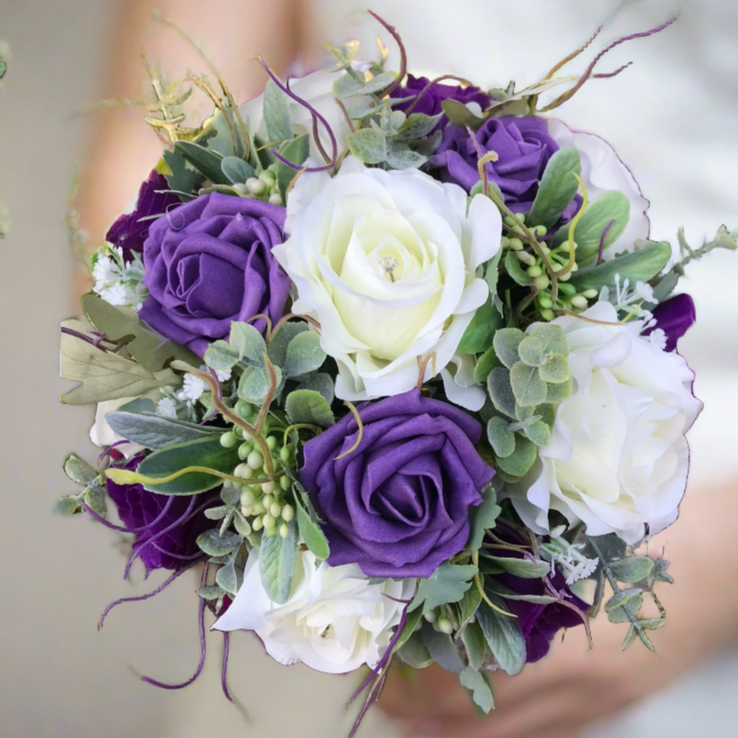 a wedding bouquet of ivory & purple artificial rose Flowers