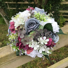 Wedding bouquet in shades of lilac grey burgundy and pink